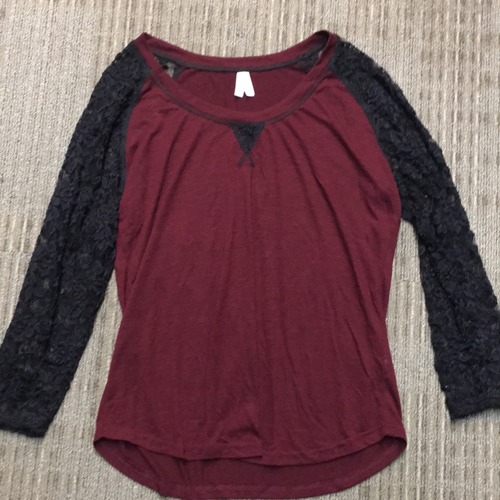 Maroon shirt with black lace arms